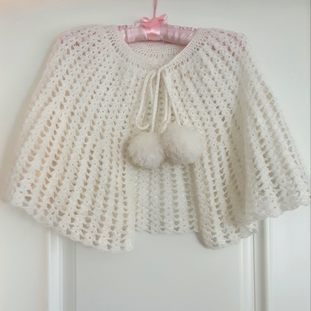 WHITE HAND CROCHETED CAPE WITH POM POMS